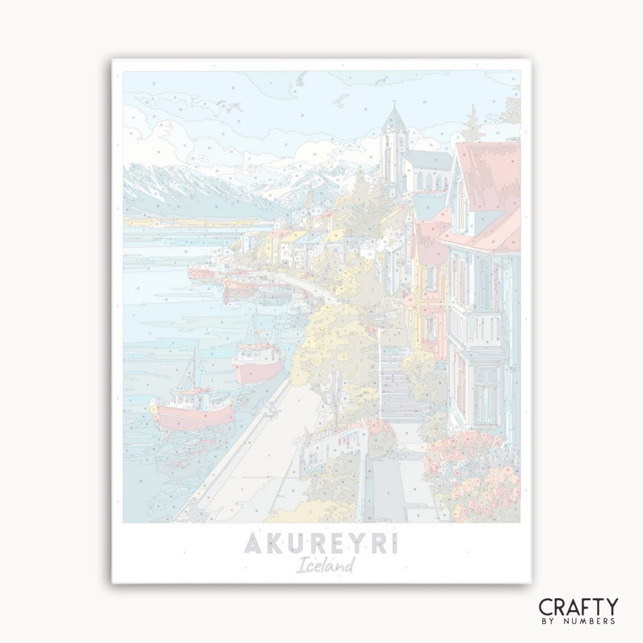 Framed artwork of a coastal scene with buildings and boats, labeled 'Akureyri, Iceland' by Crafty by Numbers.