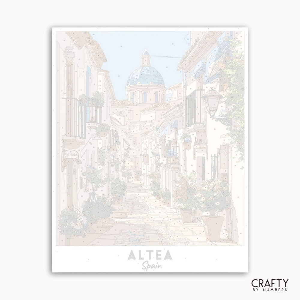 Framed artwork of a scenic view with 'Altea, Spain' text on a white background