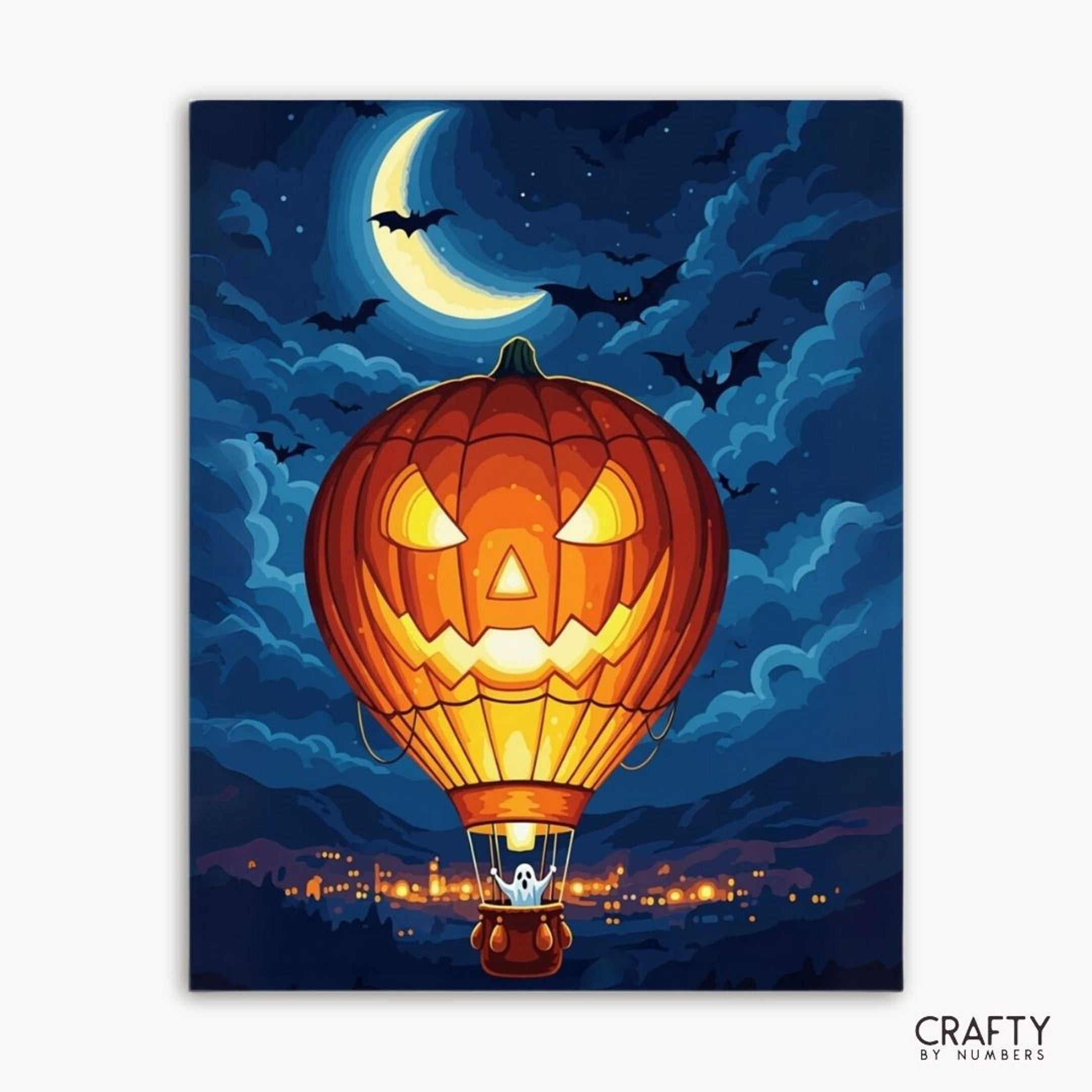 Halloween-themed artwork with a jack-o'-lantern hot air balloon against a night sky.