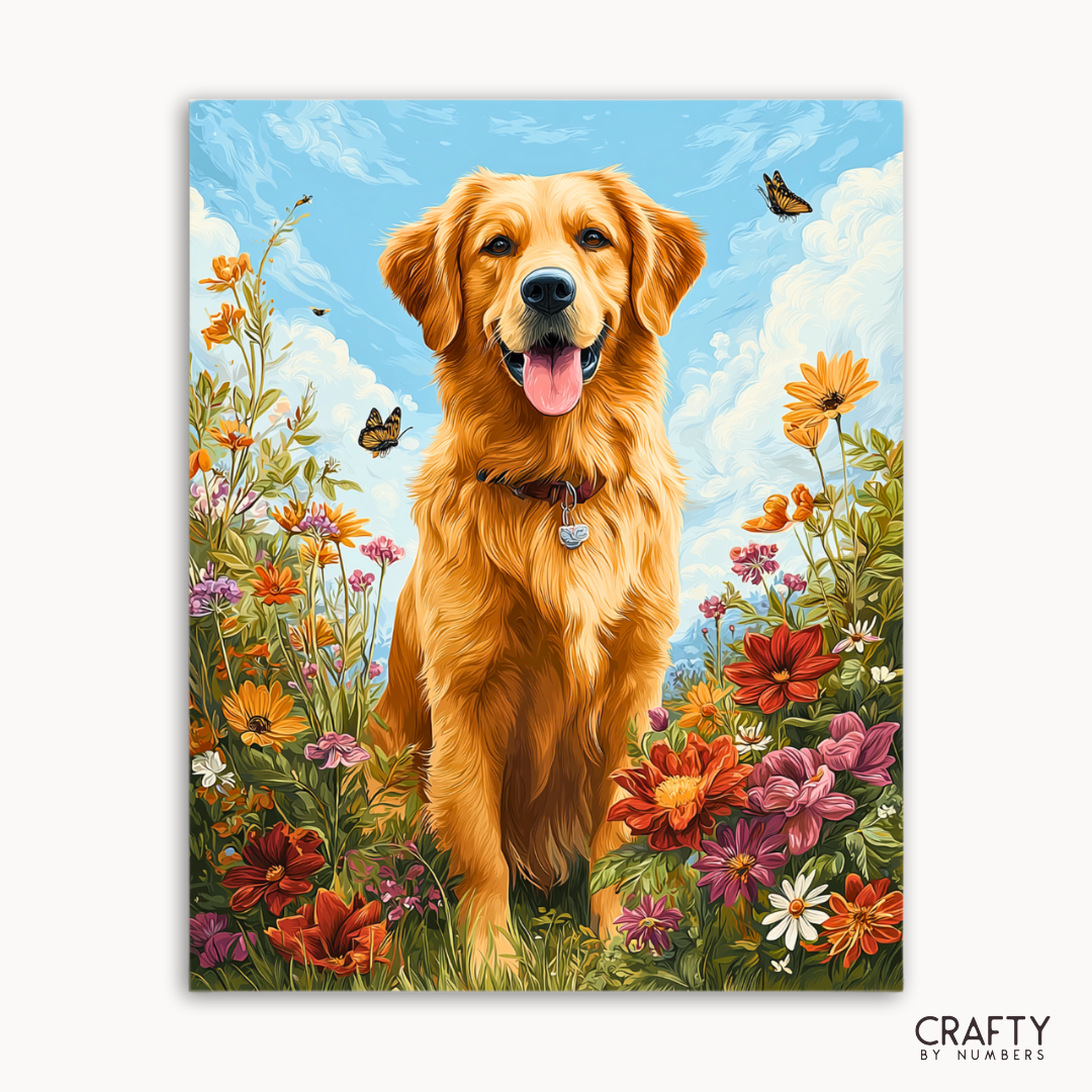 Golden retriever in a field of flowers with a blue sky and butterflies, featuring the brand 'Crafty by Numbers'.