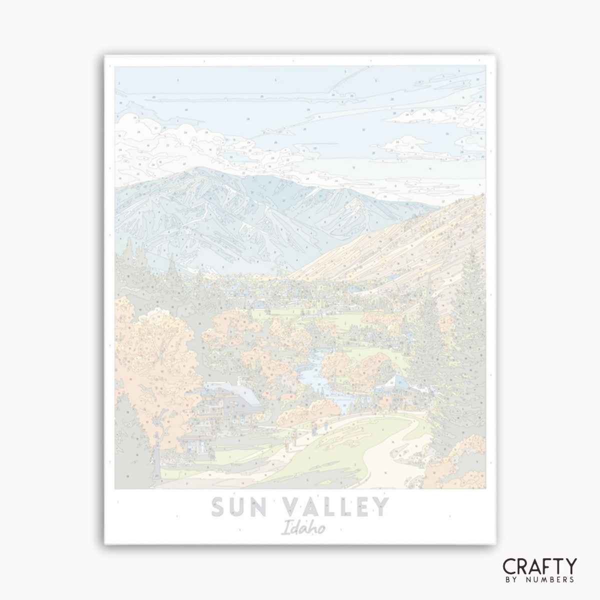Impression d'art d'un paysage de montagne avec le texte « Sun Valley, Idaho » et la marque « Crafty by Numbers ».