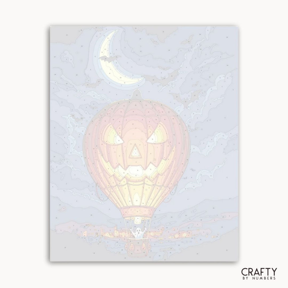 Holographic pink hot air balloon card with moon design on a light gray background
