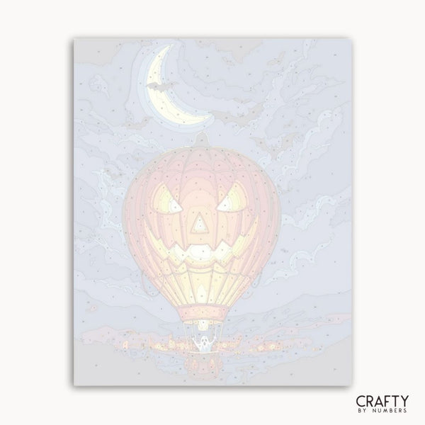 Holographic pink hot air balloon card with moon design on a light gray background