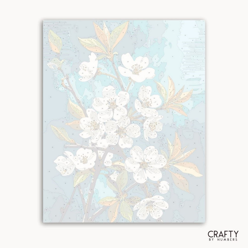 Floral design with white flowers and green leaves on a light blue background, branded 'Crafty by Numbers'.