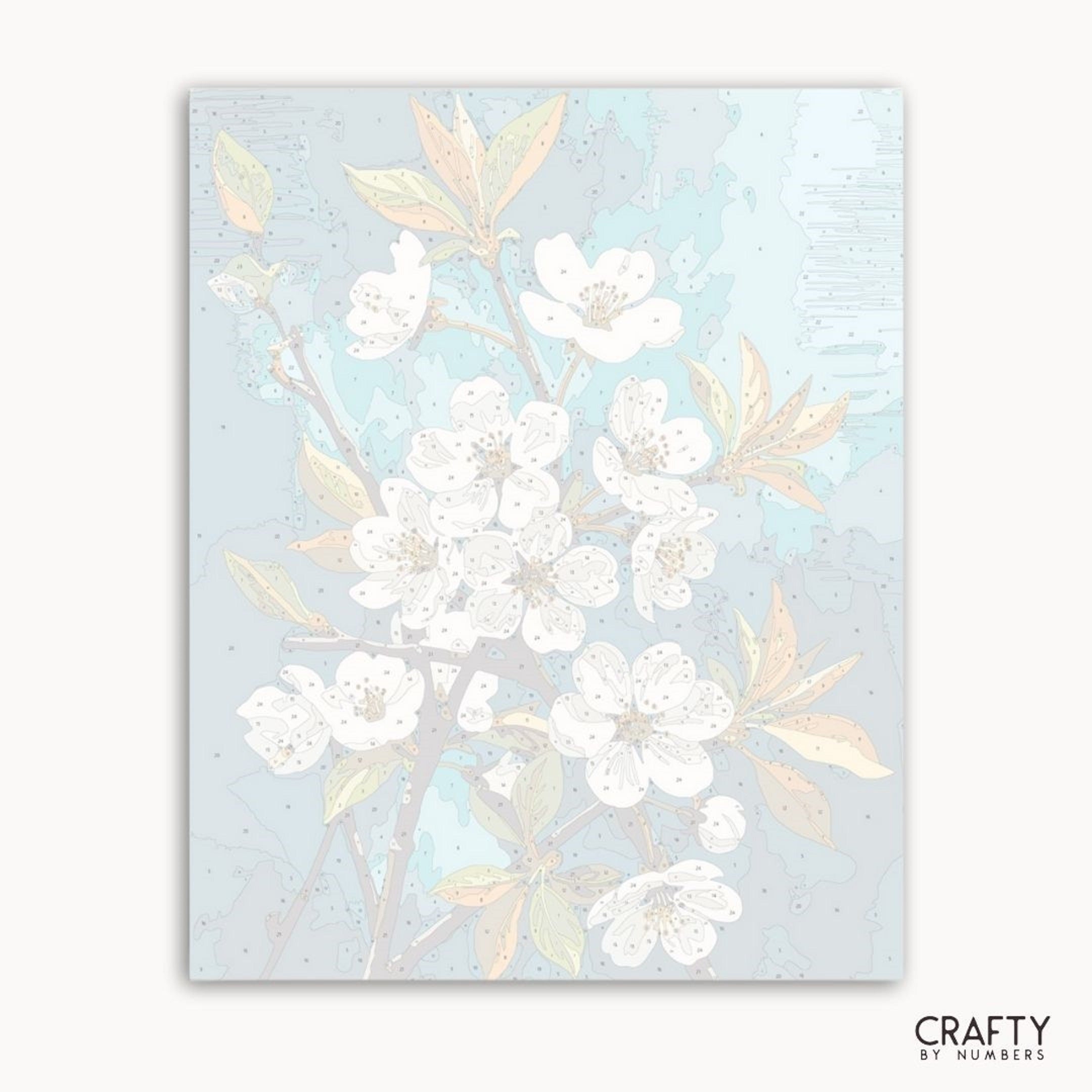 Floral design with white flowers and green leaves on a light blue background, branded 'Crafty by Numbers'.