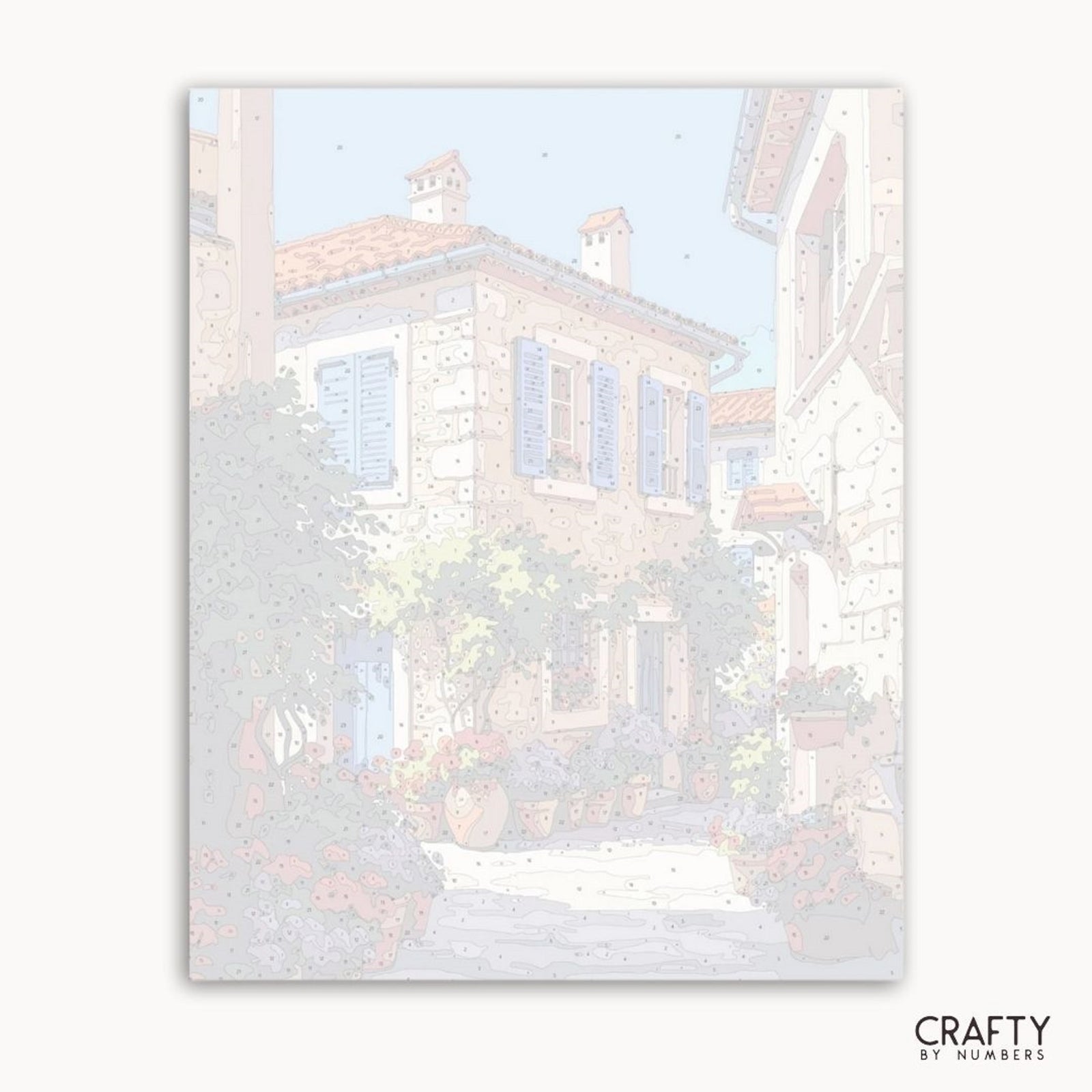 Obra de arte enmarcada de una escena de un pueblo nevado con casas y árboles, con la marca 'Crafty by Numbers'.