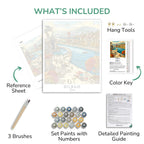 Artistic painting kit components including a map, brushes, paint set, and reference sheet.