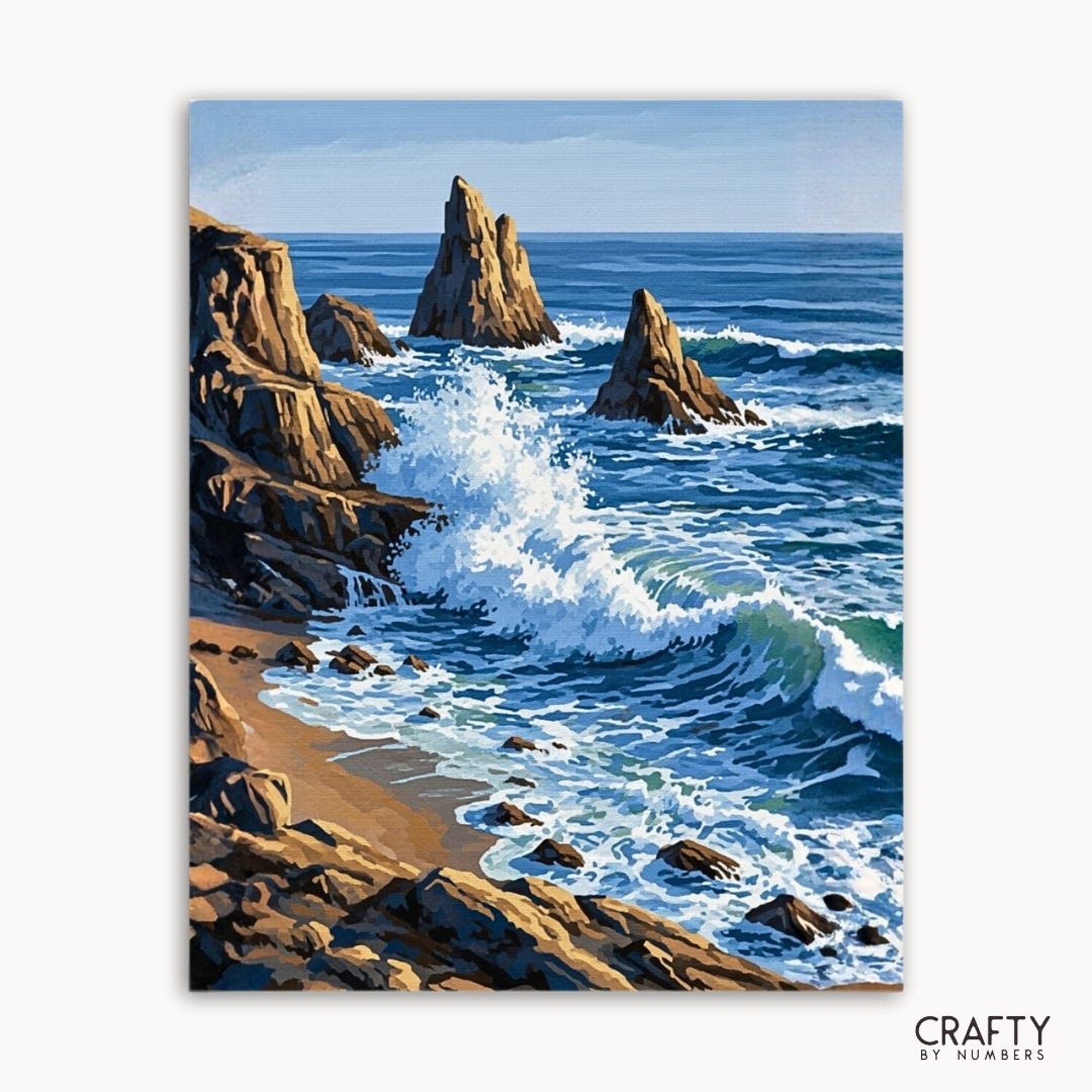 Painting of ocean waves crashing against rocks with 'Crafty by Numbers' branding.