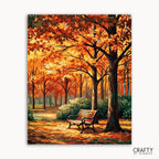 Painting of an autumn scene with trees and a bench, featuring the brand 'Crafty by Numbers'.