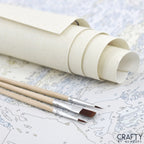 Paint by numbers kit featuring beach cottages and sea waves