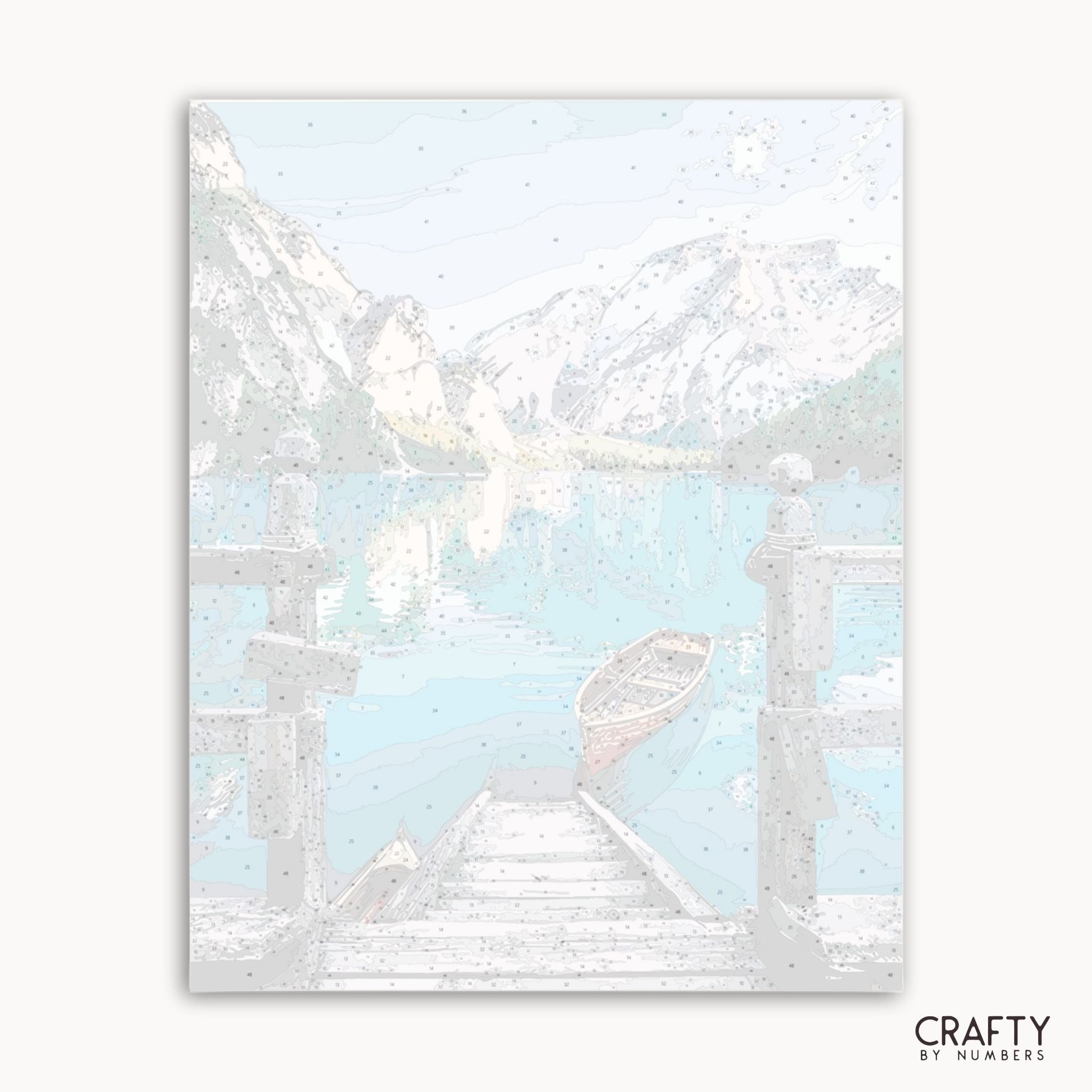 Decorative wall art with geometric shapes on a light blue background, featuring the brand 'Crafty by Numbers'.