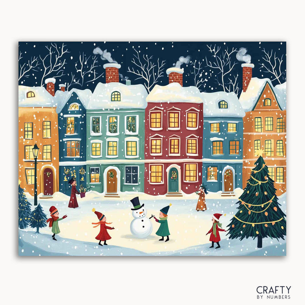 A paint by numbers kit depicting a festive winter village scene with colorful houses, a snowman, and children playing in the snow.
