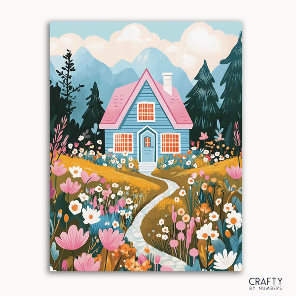 A paint-by-numbers kit depicting a serene sunrise scene with a house, flowers, and mountains.
