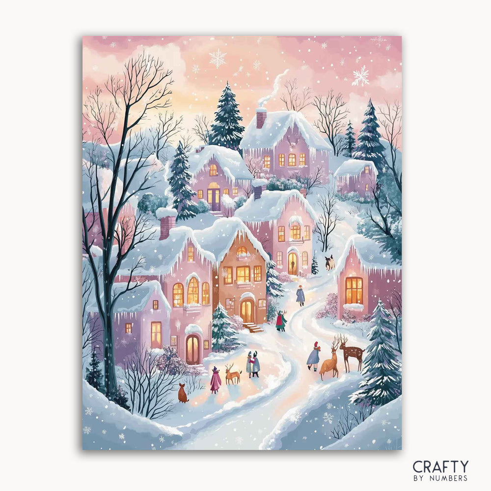 A paint by numbers kit depicting a cozy winter village scene with snow-covered cottages, people, and reindeer under a pink and purple sky at dusk.
