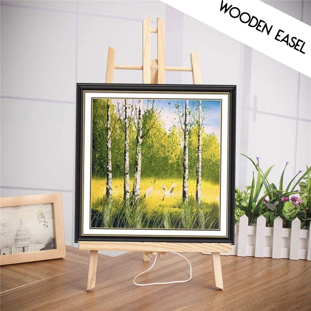Wooden Easel (Free Gift) arranged with paint brushes