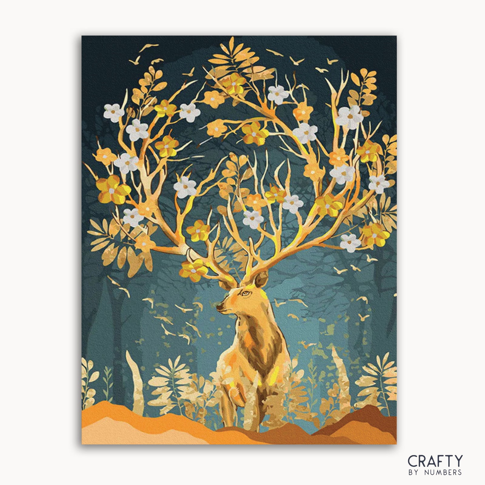 Un kit de pintura por números que representa un ciervo con cuernos dorados y astas en forma de ramas, rodeado por un bosque y un fondo iluminado por el sol.