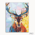 A paint-by-numbers kit depicting an abstract style deer with a geometric pattern in multiple colors on a framed canvas.