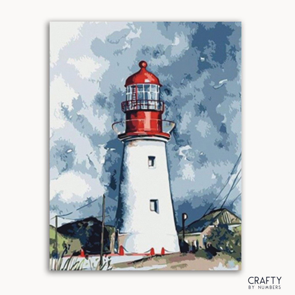 A paint-by-numbers kit depicting an abstract lighthouse scene with a red and white lighthouse against a blue sky with white clouds.