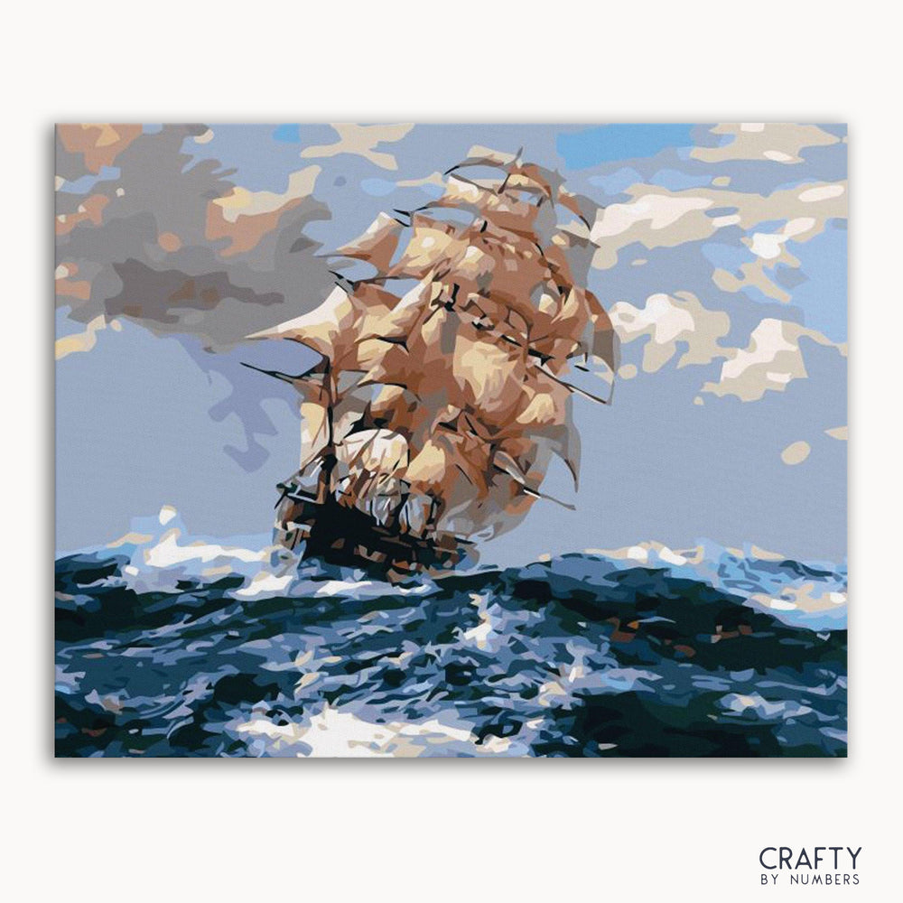 A paint-by-numbers kit image featuring an abstract sailing ship with a colorful sky and ocean waves.