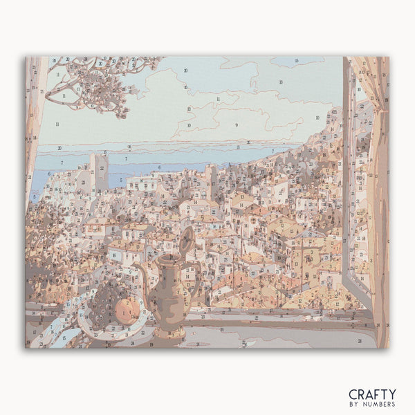 Paint by numbers kit featuring a serene mountain landscape at sunset