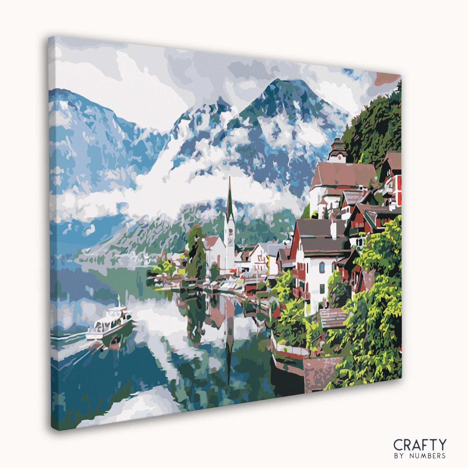 Nahaufnahme nummerierter Farbflächen auf der Leinwand „Österreichische Alpenstadt“.