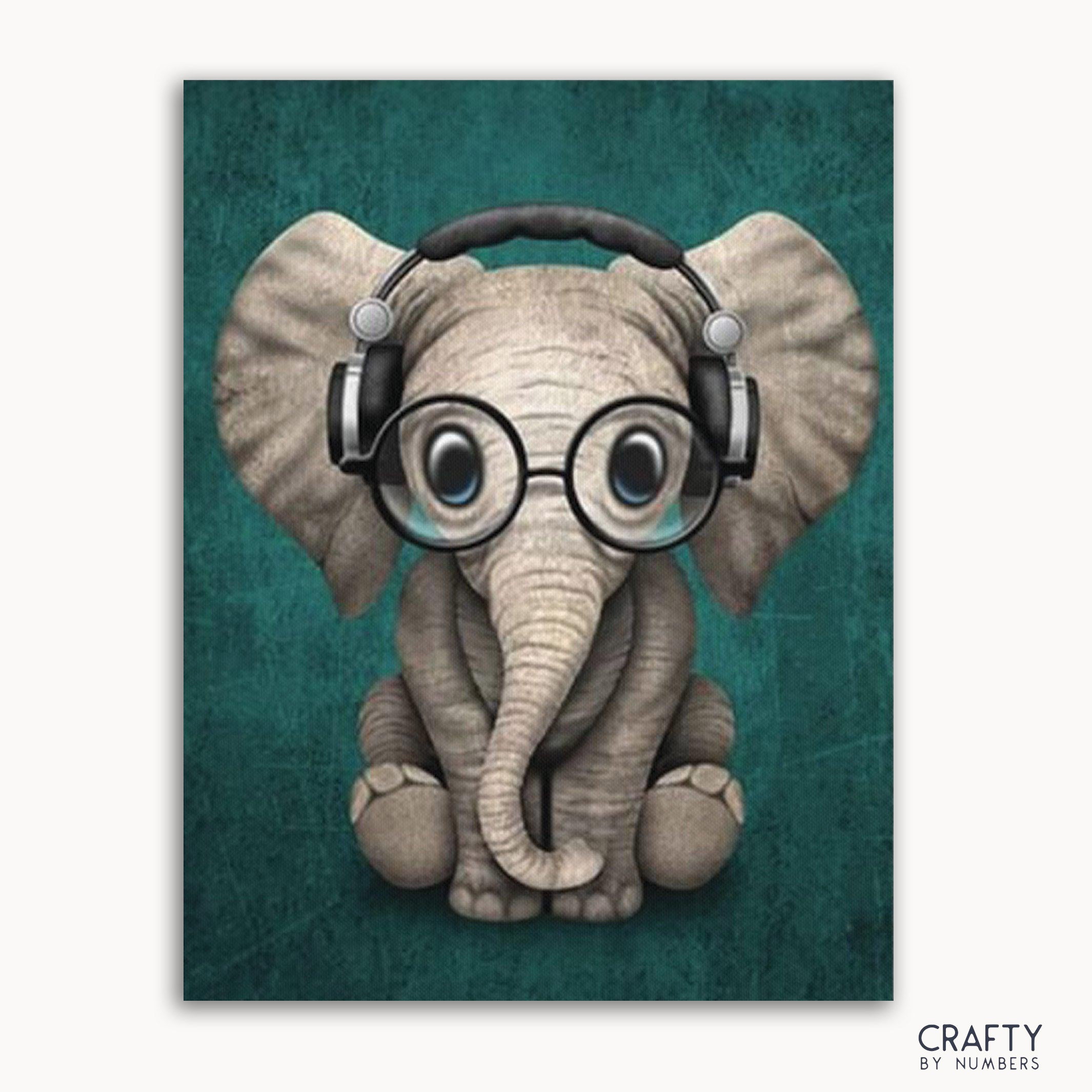 A paint-by-numbers kit image featuring a baby elephant with headphones on, against a blue background.