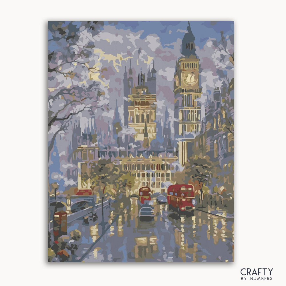 A paint-by-numbers kit depicting a street view of London with Big Ben in the background, including a red double-decker bus and a phone booth.