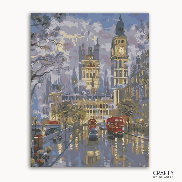 A paint-by-numbers kit depicting a street view of London with Big Ben in the background, including a red double-decker bus and a phone booth.