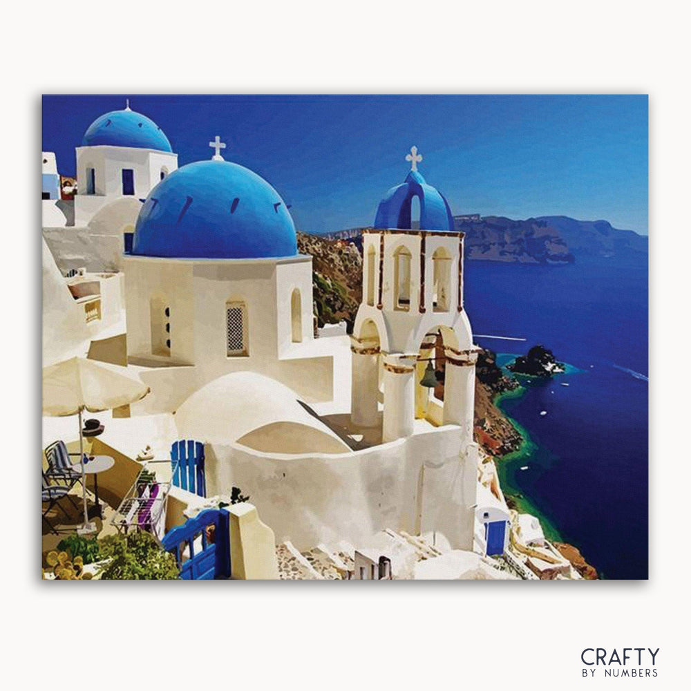 A paint-by-numbers kit image featuring a blue and white scene with domed buildings, likely Mediterranean in style.