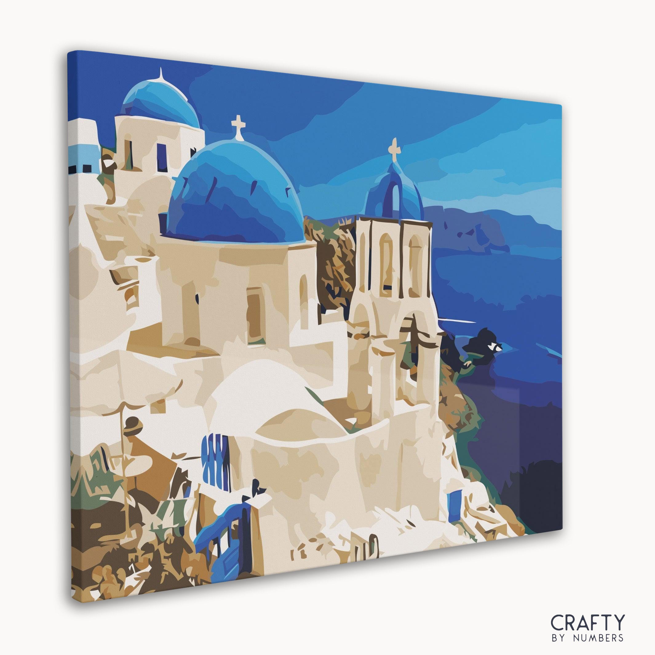 DIY paint by numbers of Santorini’s white houses and blue domes.