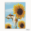 A paint-by-numbers kit image featuring a cat sleeping on a sunflower with a blue sky in the background, among multiple sunflowers.