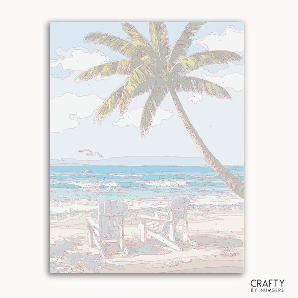 Paint-by-numbers kit featuring two wooden chairs on a sandy beach at sunset.