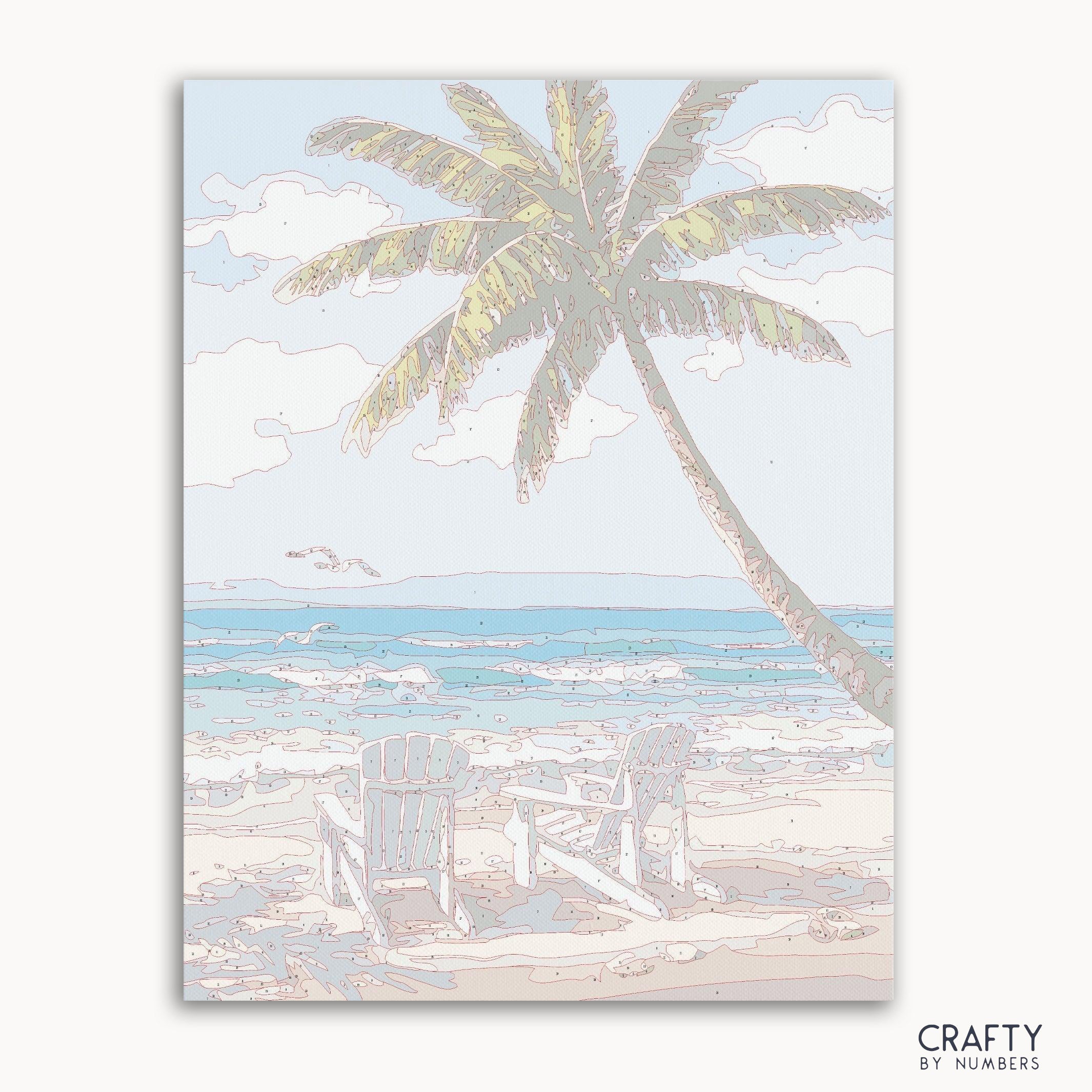 Paint-by-numbers kit featuring two wooden chairs on a sandy beach at sunset.