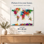 Colorful World Map displayed on a sunlit wall. Canvas size 50 × 40 cm.