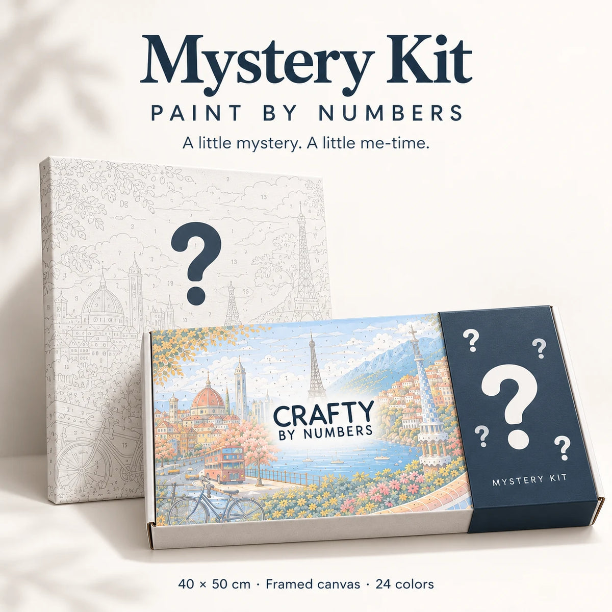 Crafty by Numbers Mystery Kit with illustrated box, question-mark sleeve and 40 × 50 cm framed canvas, 24 colors.