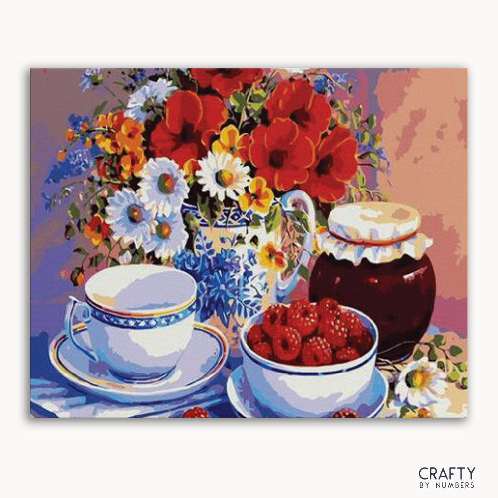 A paint-by-numbers kit image featuring cups with decorative flowers and a vase, with a colorful floral arrangement in the background.