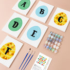 Close-up of Easter Egg Hunt Alphabet numbered linen canvas showing detailed sections for painting colorful Easter eggs with hidden letters