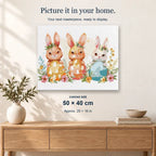 Easter Egg-trio displayed on a sunlit wall. Canvas size 50 × 40 cm.