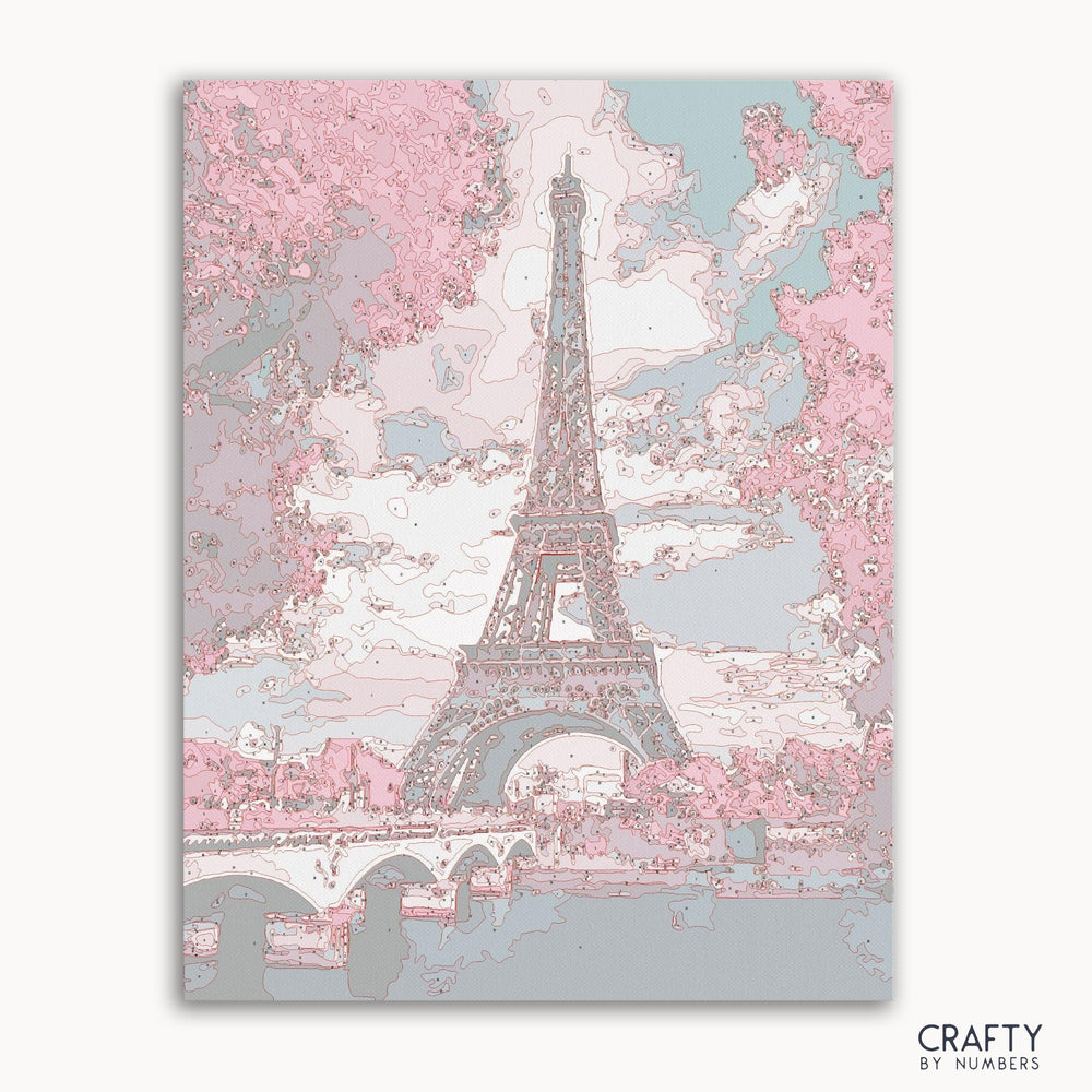 Eiffel Tower paint by numbers kit canvas with detailed landscape.