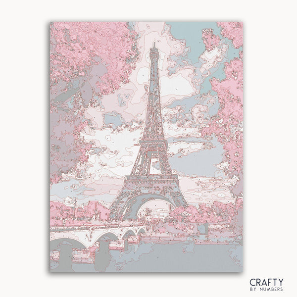 Eiffel Tower paint by numbers kit canvas with detailed landscape.