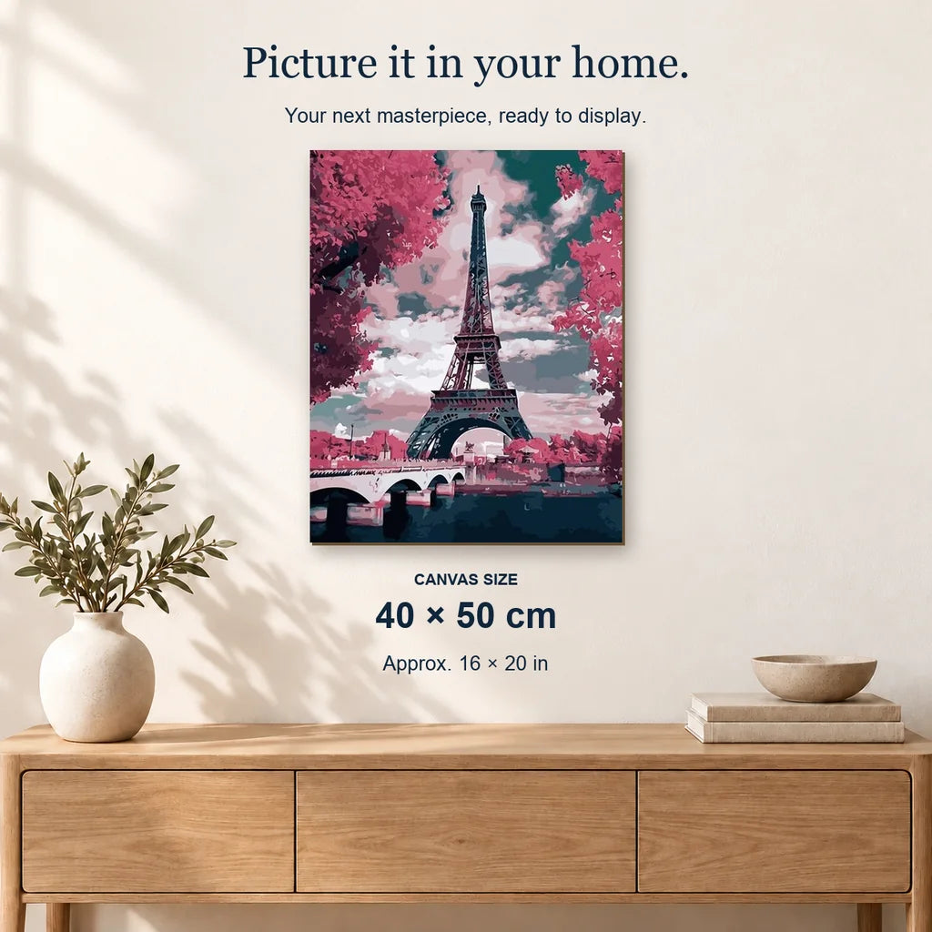 Eiffel Tower Landscape displayed on a sunlit wall above an oak cabinet. Canvas size 40 × 50 cm.