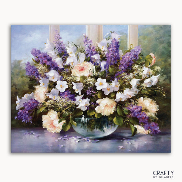 A paint-by-numbers kit image featuring a floral arrangement in a glass bowl.