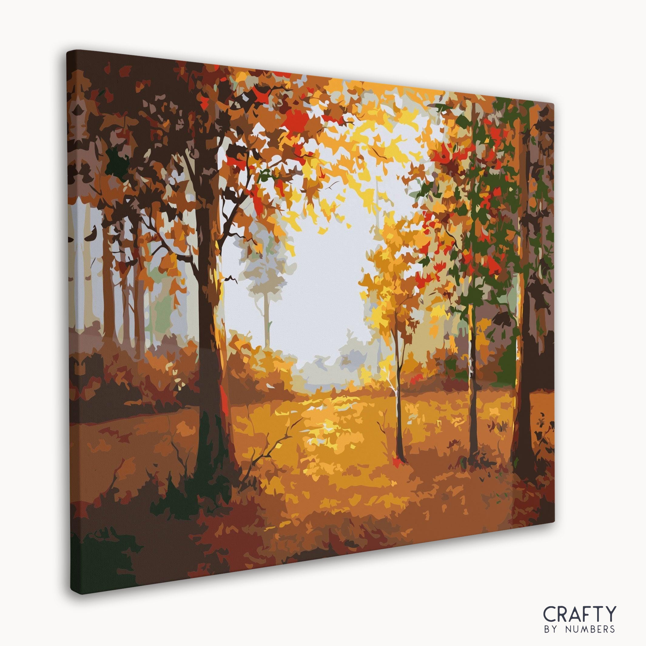 Close-up of completed Forest in Autumn paint by numbers canvas with vibrant leaves