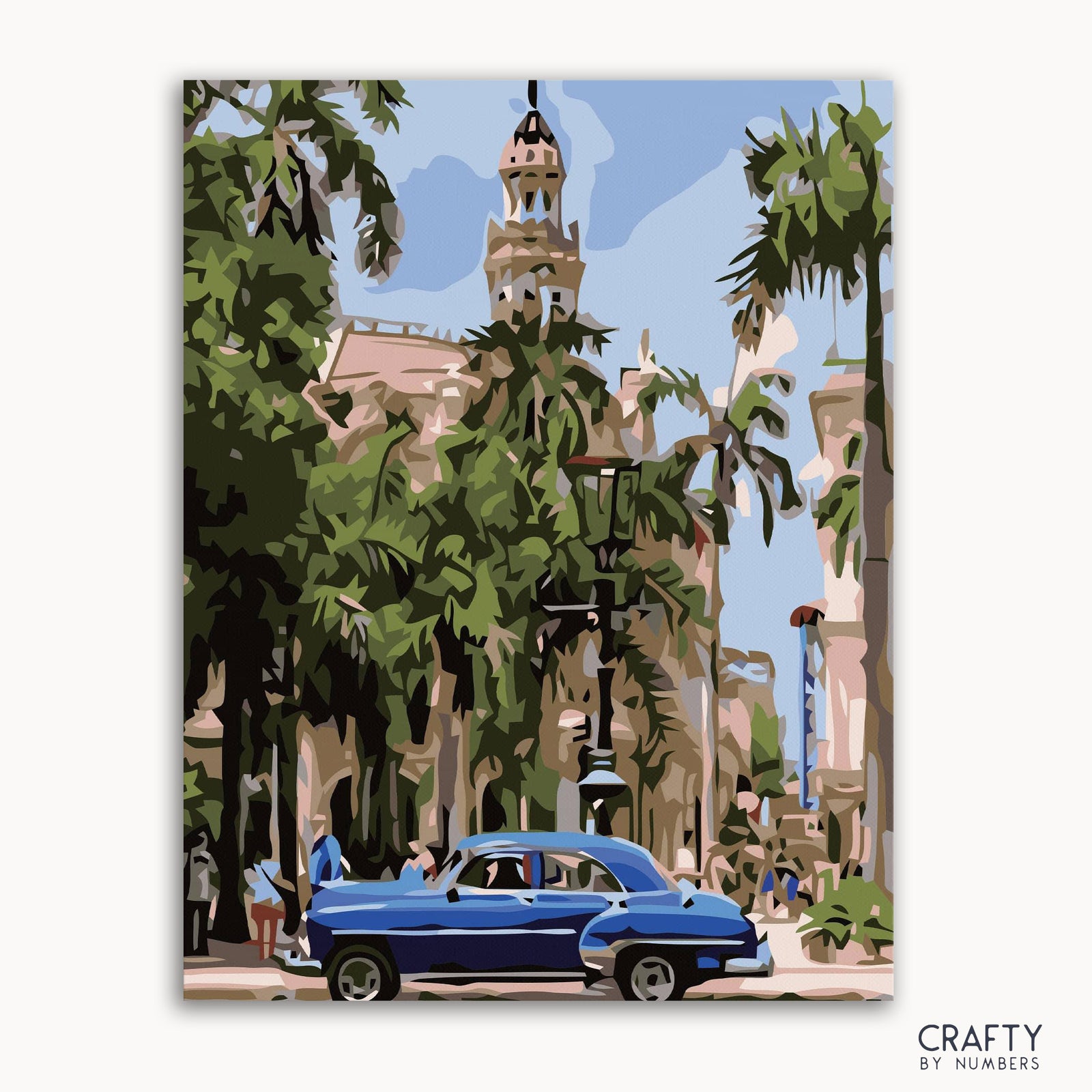 Ein Bild eines Malen-nach-Zahlen-Sets mit einem Oldtimer in Havanna, Kuba, mit einer Stadtlandschaft im Hintergrund.