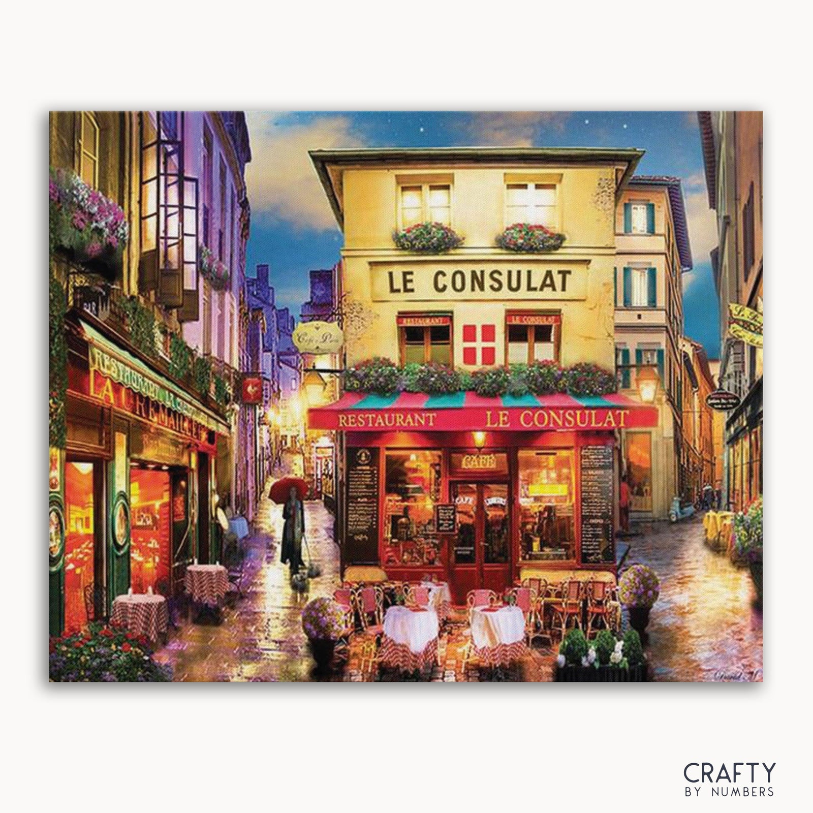 Un kit de pintura por números que representa una vibrante escena callejera con un restaurante llamado 'Le Consulat' decorado con flores, mesas y sombrillas.