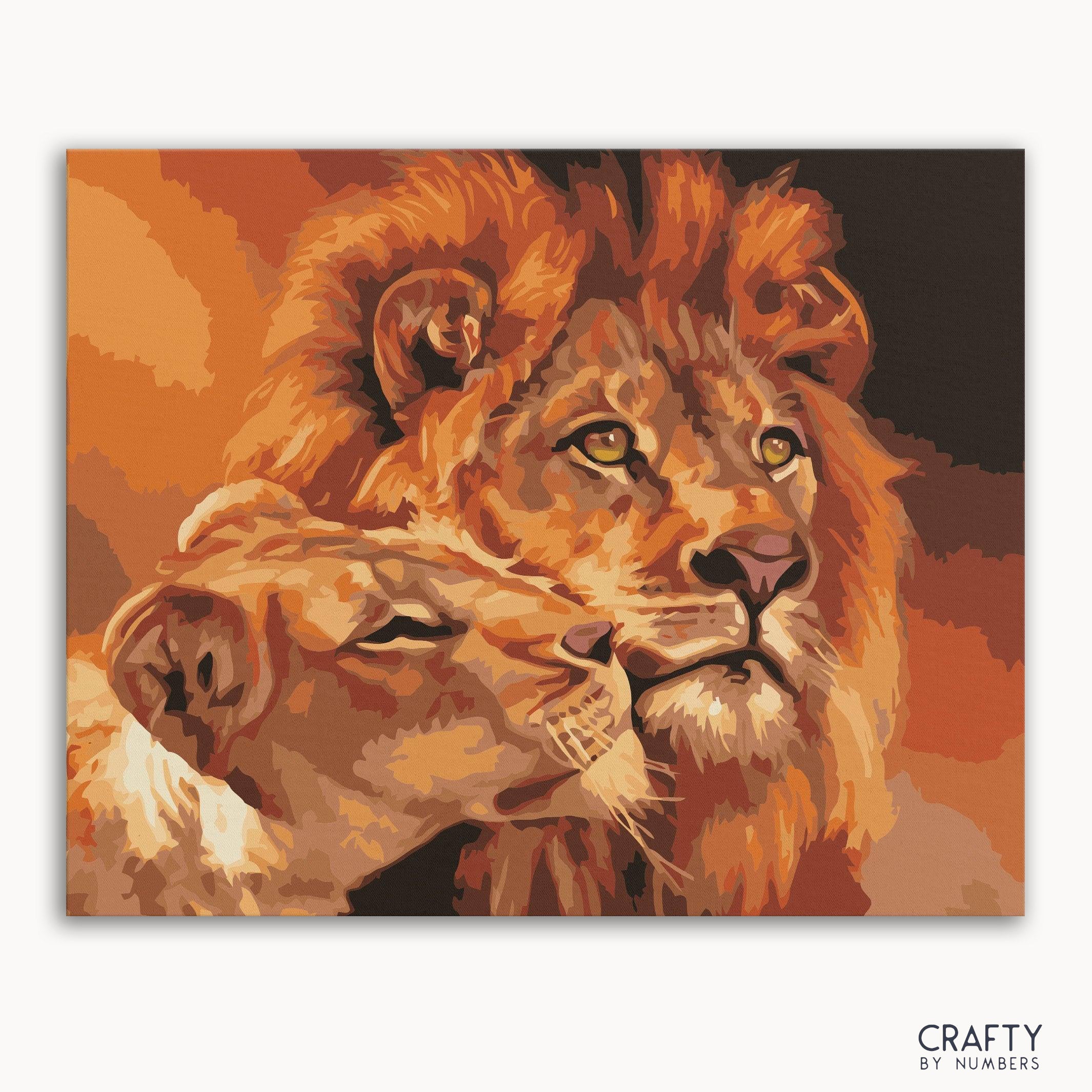 A paint-by-numbers kit image featuring a artistic depiction of a lion and lioness with a warm color palette.