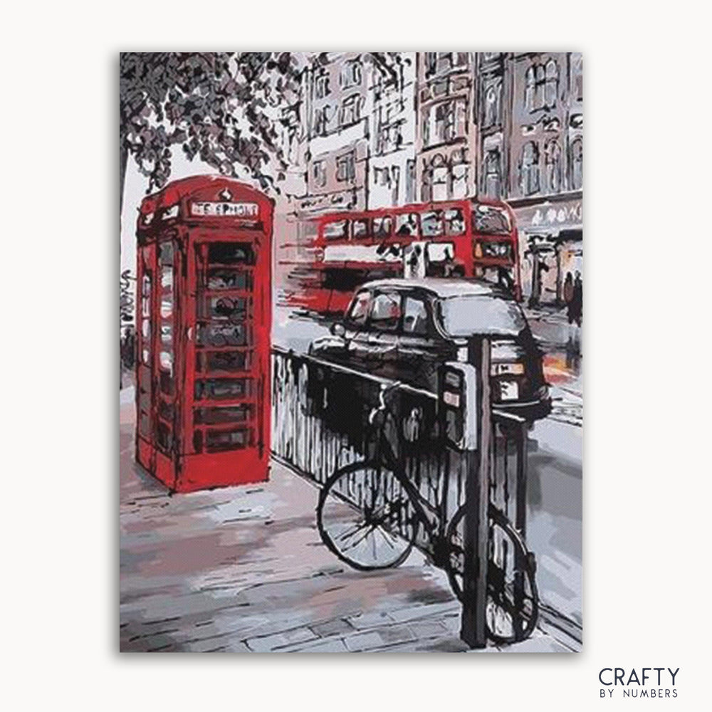 A paint-by-numbers kit depicting a vibrant city scene with a red telephone box, vintage car, and a bicycle.