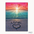A paint by numbers kit depicting a beach scene with a sunset and the word 'LOVE' written in the sand.