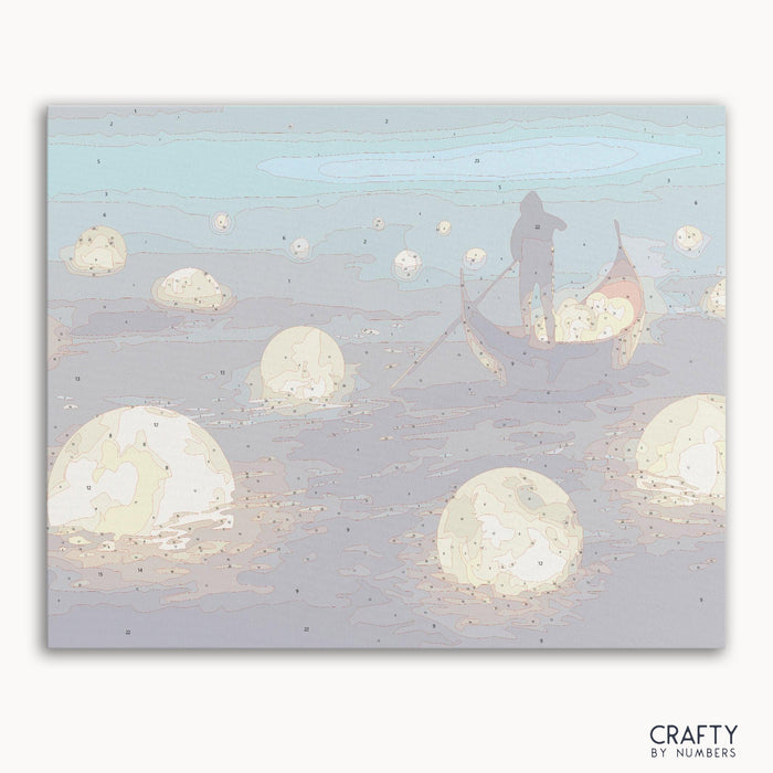 Man rowing a small boat amidst glowing moons paint by numbers canvas closeup.