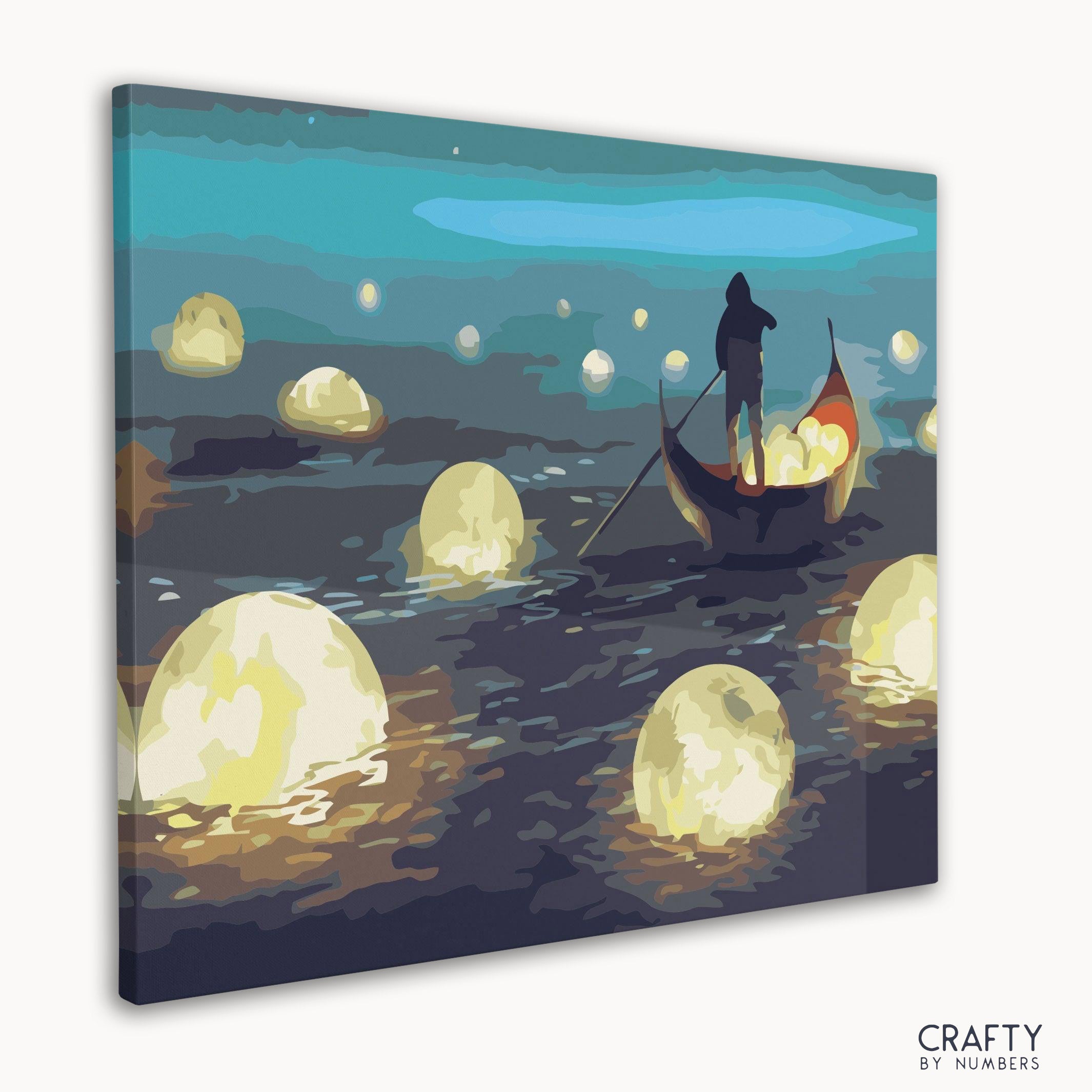 Detailed section of glowing moons and water reflections from paint by numbers kit.